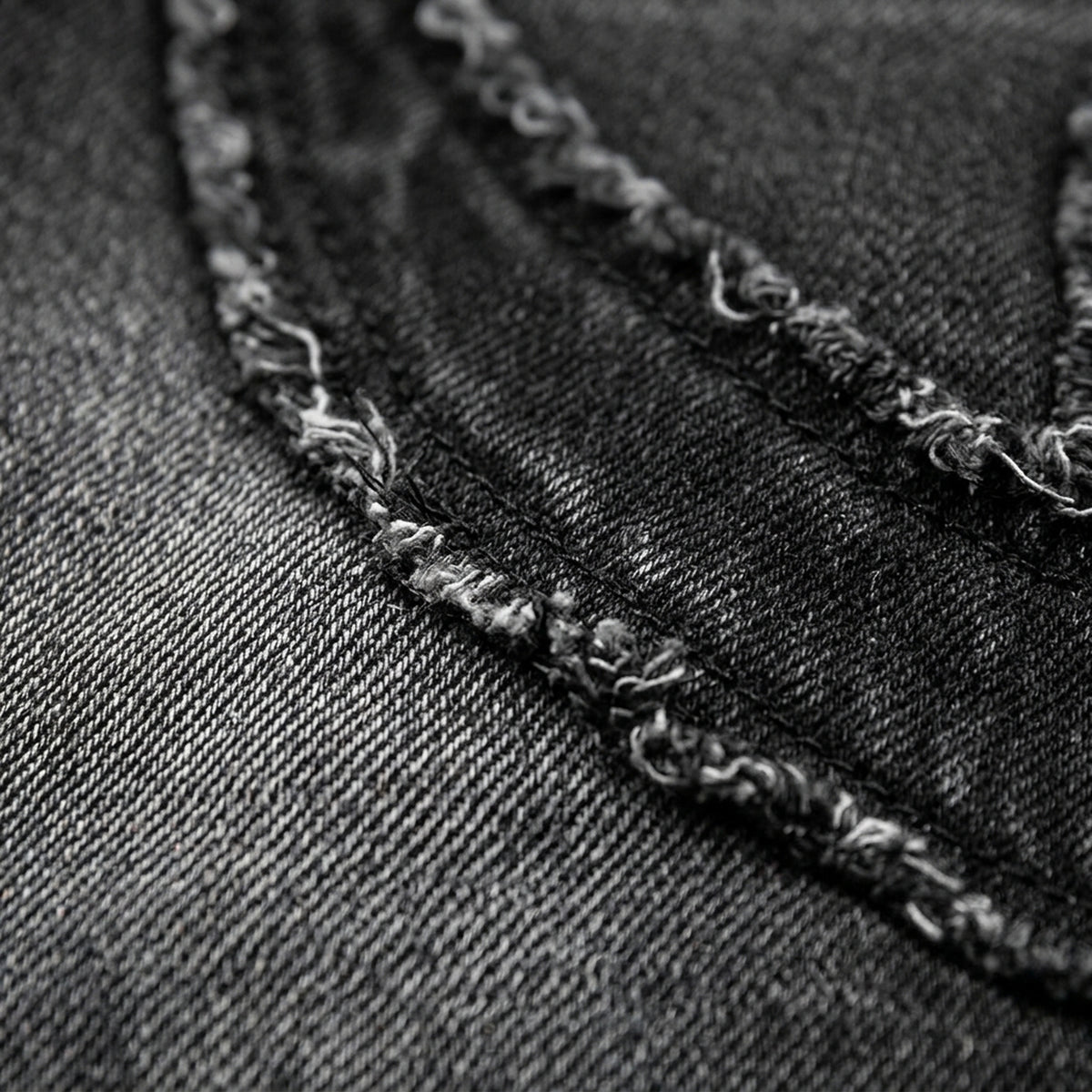 Stack Jeans, Makro der aufgesetzten Flamme mit roher Kante